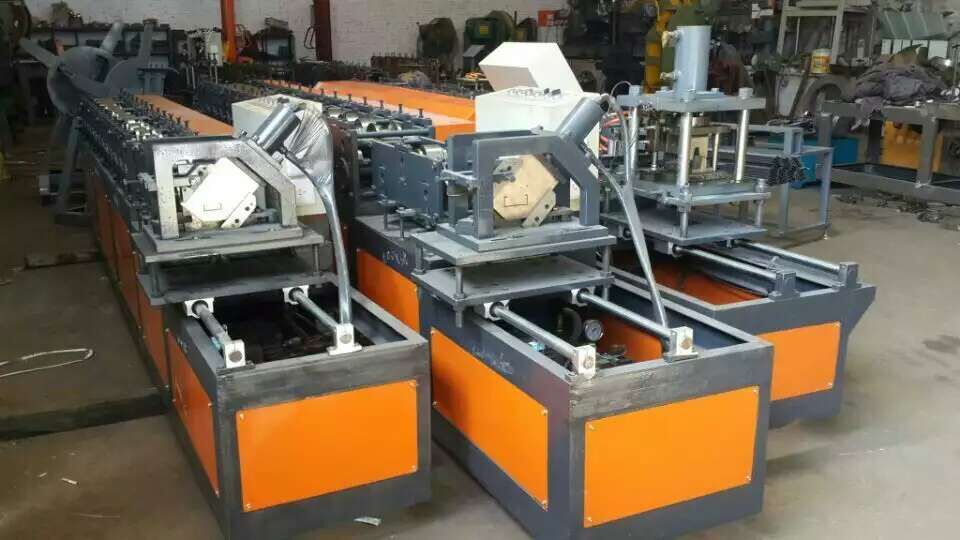 Metal coil forming machine