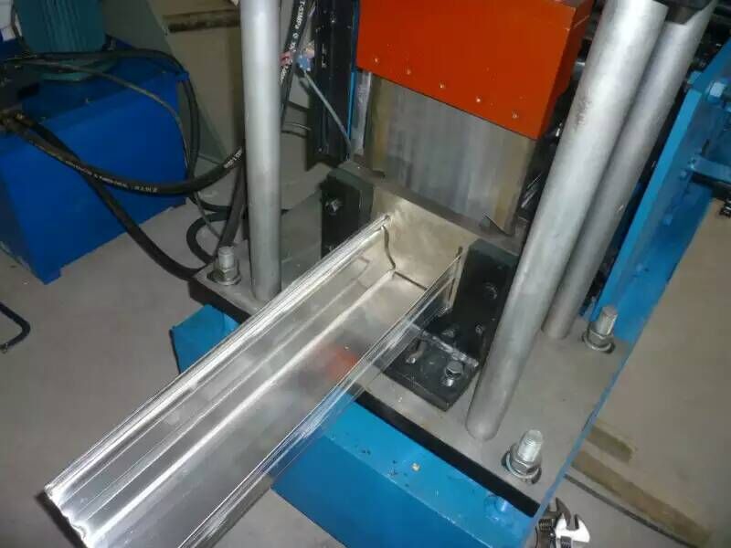 Gutter roll forming machine