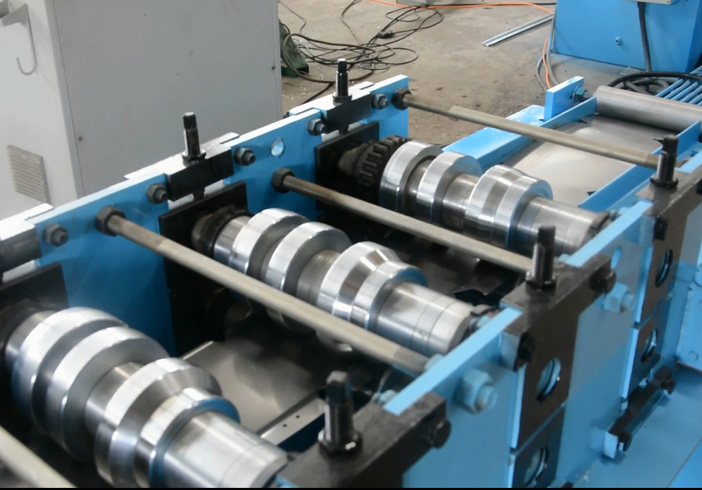 Roll forming machine for distribution box